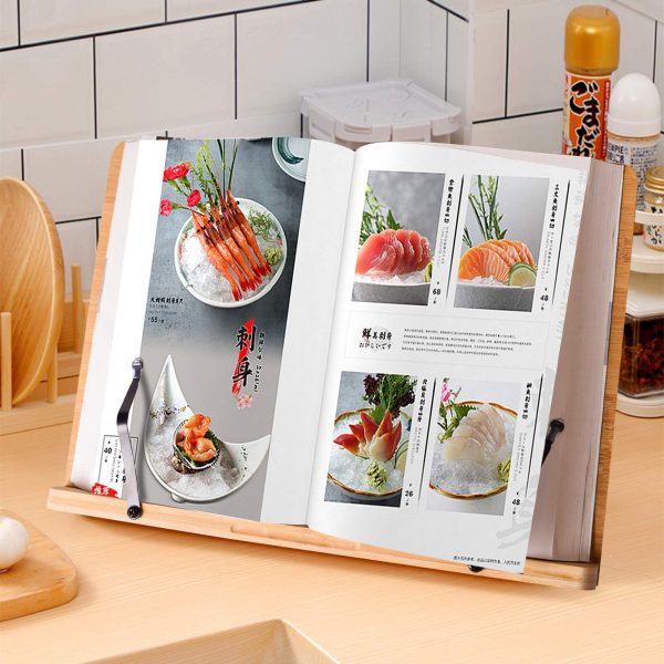 Adjustable bamboo cookbook stand holding an open recipe book on a kitchen counter