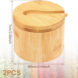 Close-up of rotating bamboo lid with spoon groove and matching small bamboo spoon
