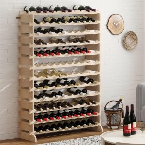 Floor wine rack with scalloped bottle rails and stacked short end blocks in an angled room view