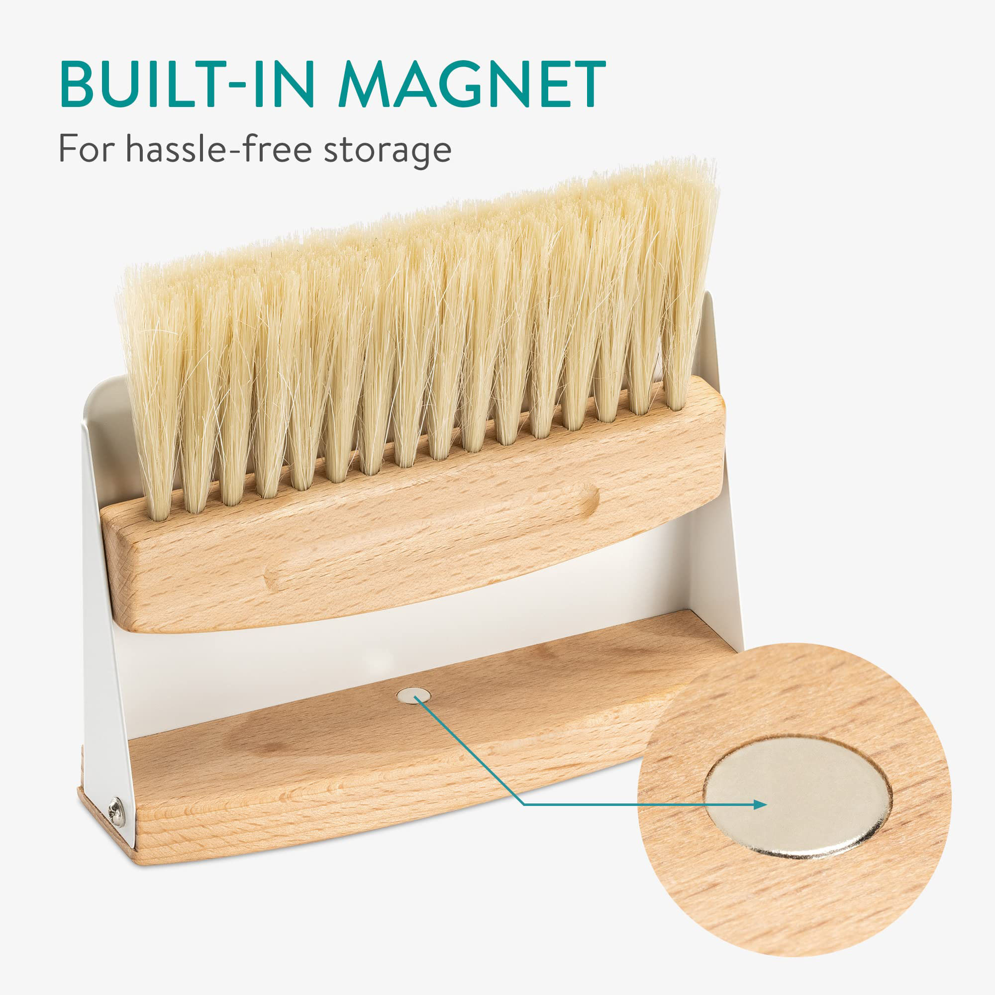 Dustpan and brush storage graphic showing a round insert set into the wooden grip area