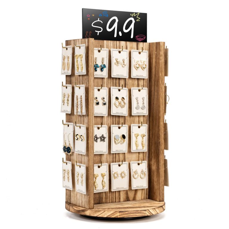 Wood jewelry display stand with rows of hooks holding earring cards beneath a black sign panel