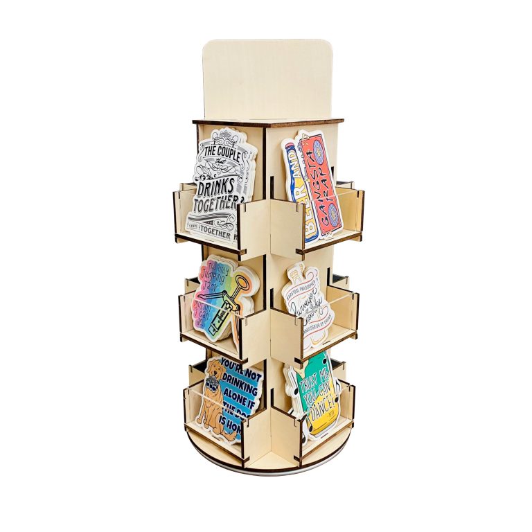 Wooden tabletop display stand with three tiers of clear-front pockets holding printed merchandise