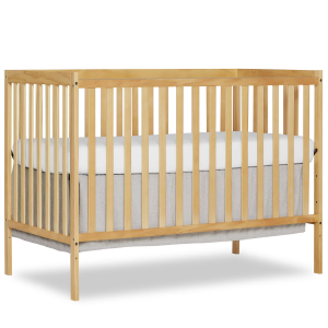 Wooden crib with a natural-toned rectangular frame, vertical slats and straight corner posts, shown with a mattress against a white background