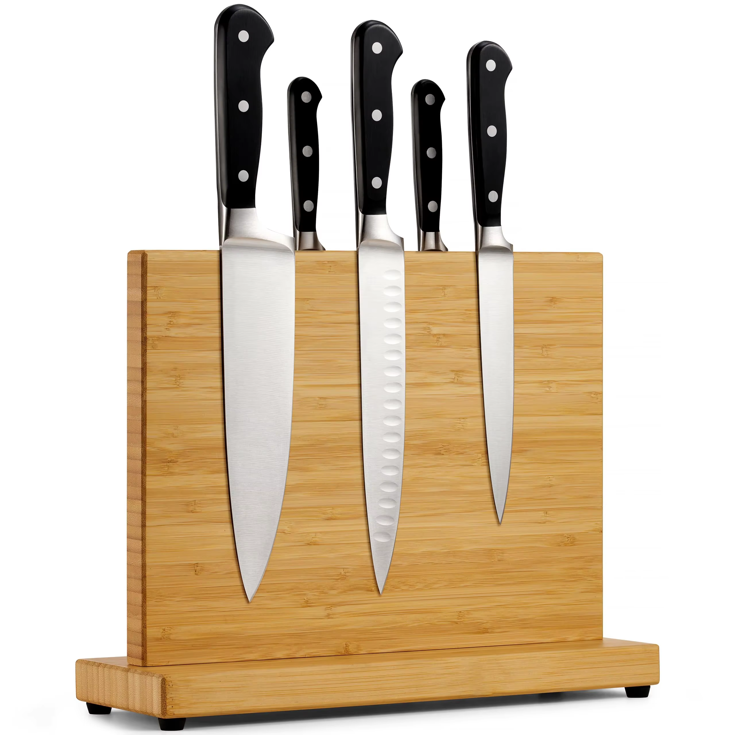 Angled view of a wood-grain magnetic knife holder with a broad base and small black feet, pictured with knives