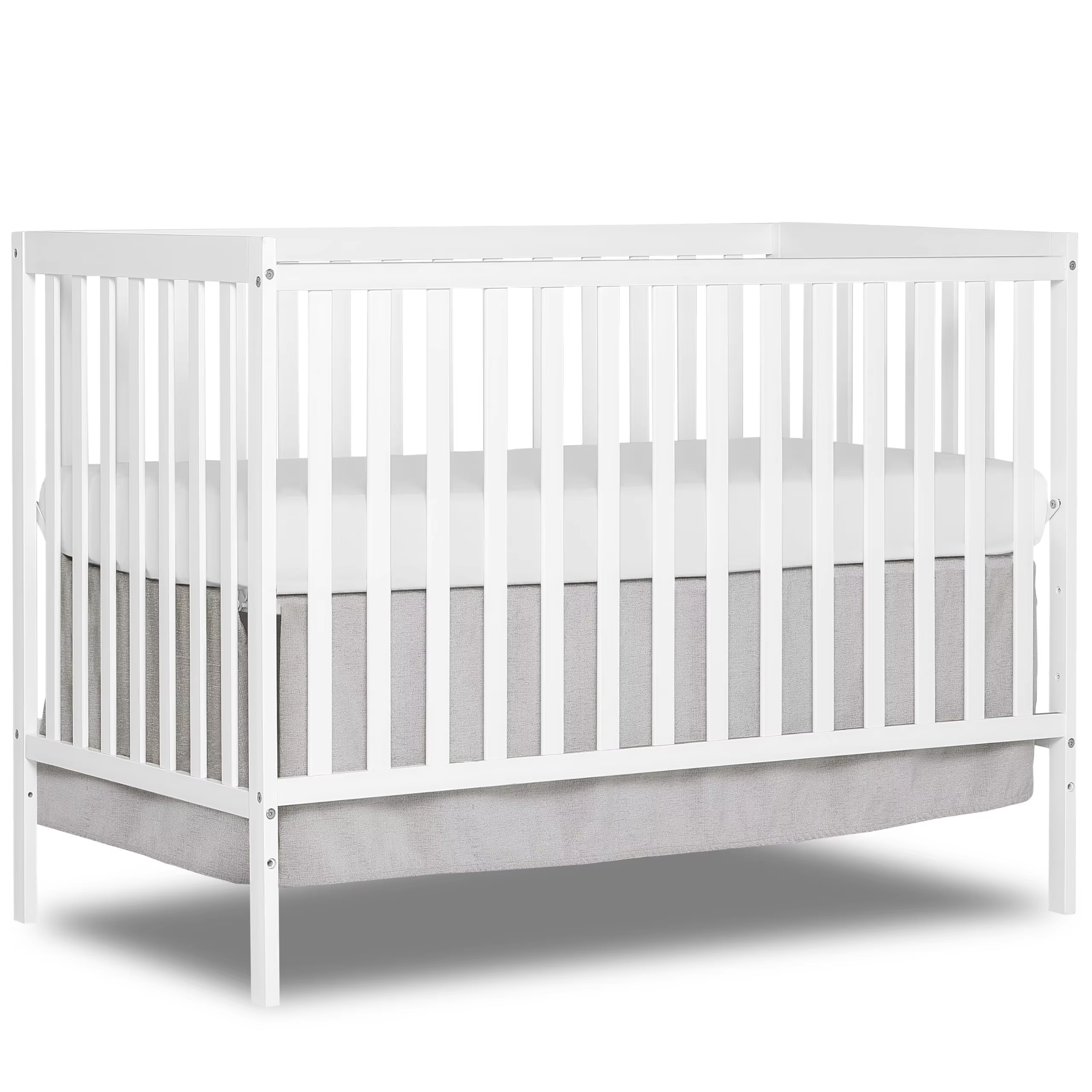 White-finished wooden crib with vertical slats, straight top rails and corner posts, pictured with a mattress against a white background