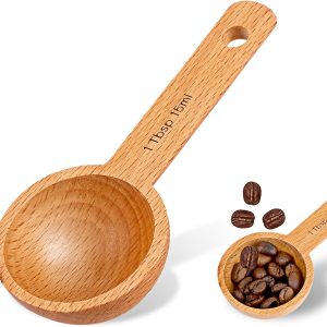 Wooden measuring spoons shown empty and filled with coffee beans, with 1 Tbsp 15ml marked on the handle