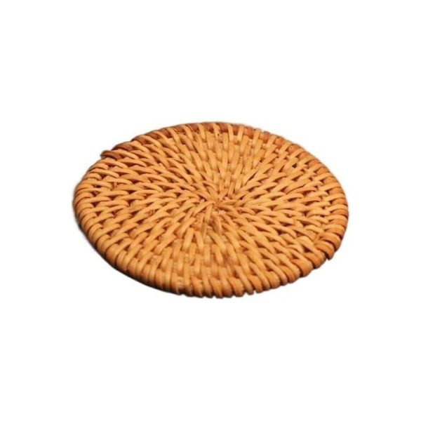 Single round rattan coaster with a radiating woven pattern and wrapped edge on a white background