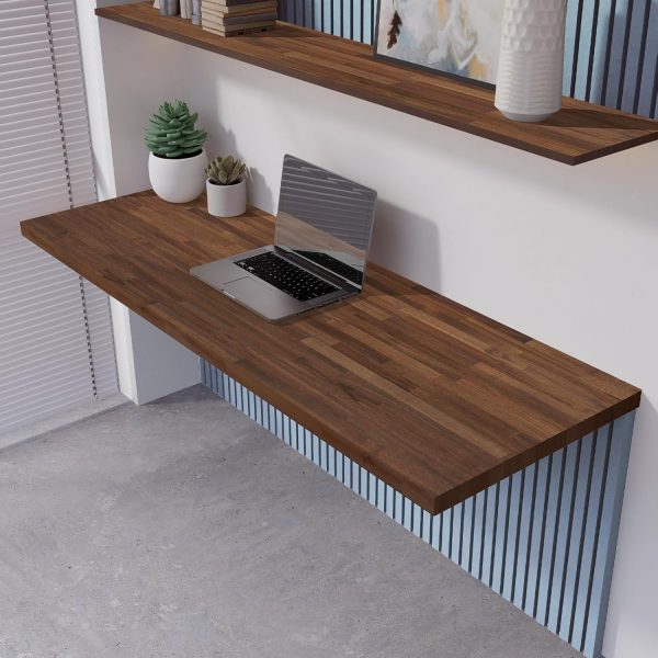 Dark walnut colored acacia panel used as a wall-mounted desktop beneath a matching shelf