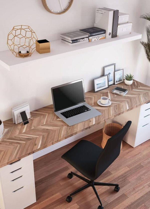 Patterned acacia desktop above white drawer units with a laptop and office chair