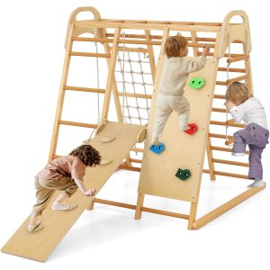 Wooden indoor jungle gym with ladder rungs, overhead bars, a rope net and a foothold ramp, pictured with children against a white background