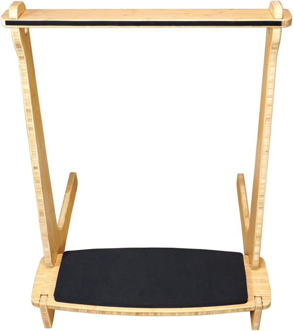 Paddleboard storage rack with two wood-grain side frames, long feet, a black base pad and a narrow black upper strip on a white background