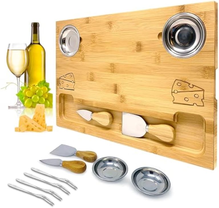 Angled bamboo cheese board with two round bowls, a long serving groove, cheese knives and four small forks