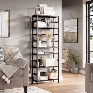 Dark brown six-tier bamboo bookcase beside a sofa, holding books, vases and storage baskets