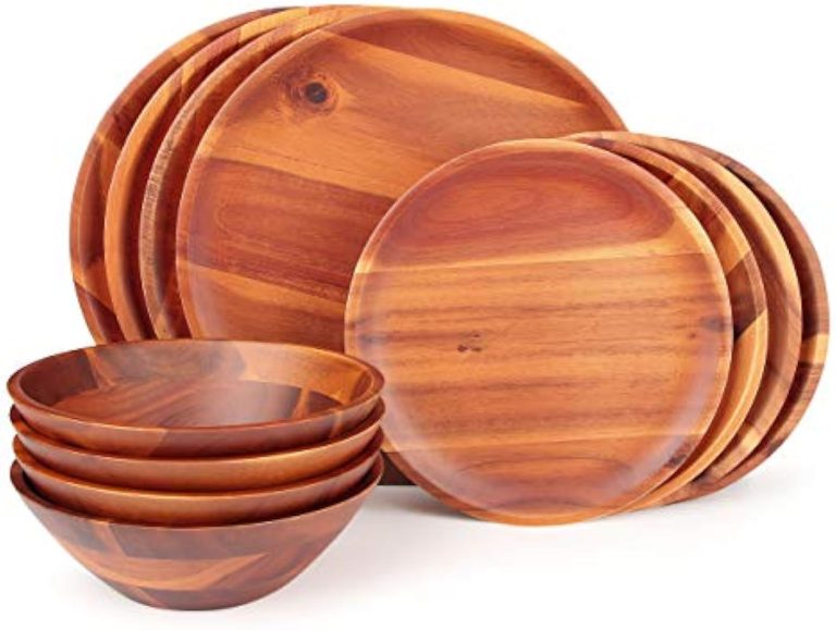 Complete wood dinnerware set with four large plates, four small plates and four stacked bowls