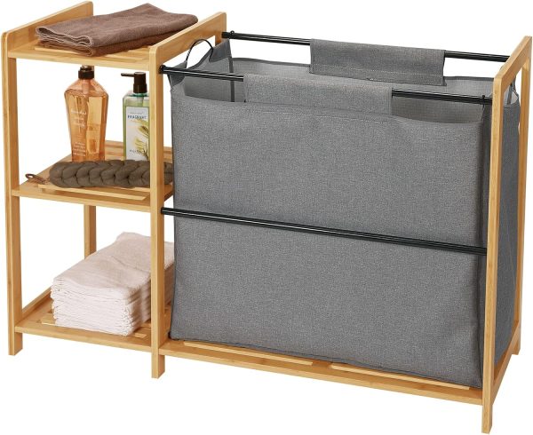 Bamboo laundry hamper with a large gray fabric bag, black support rails and three open side shelves