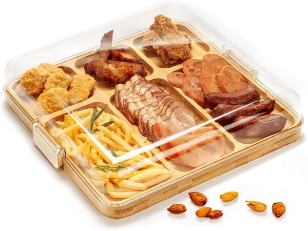 Square bamboo charcuterie board with lid, six recessed compartments and buckle closures, shown with assorted snacks