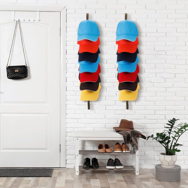 Two vertical wooden hat racks displaying colourful baseball caps above an entryway shoe shelf