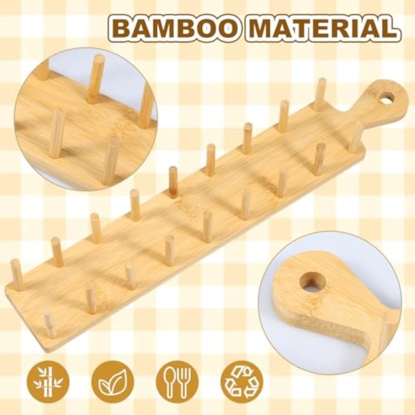 Empty bamboo taco holder with close-ups of the upright divider pegs and rounded handle with a hole