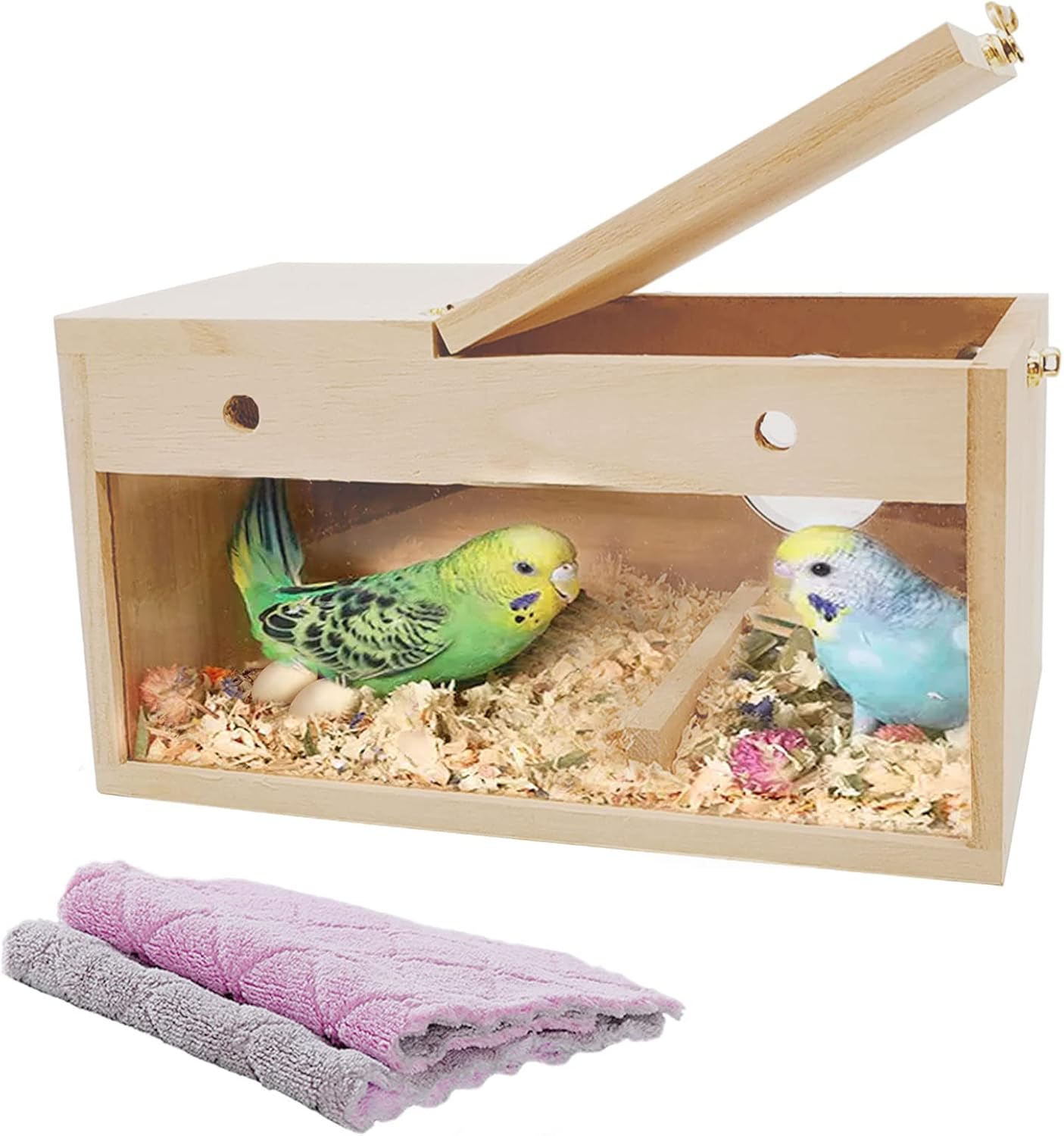 Pine bird nest box with a clear side panel, top lid open and two fabric pads pictured below