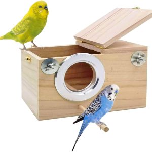 Pine parakeet nest box with a metal-rimmed round entrance, wooden perch, washers and wing nuts, and top lid open